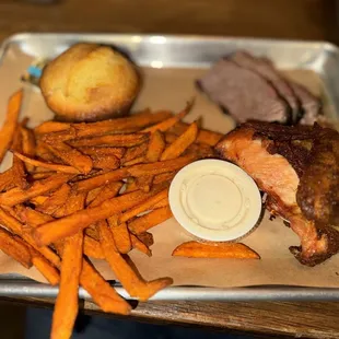 1/2 Chicken 1/2 lb. Brisket Sweet potato fries Corn bread