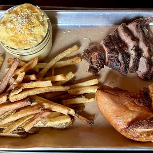 Mac &apos;n cheese, brisket, fries, and chicken