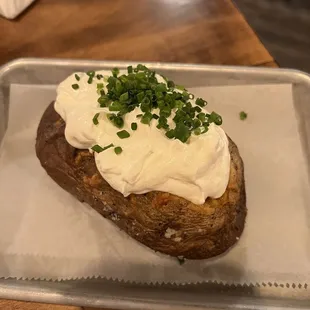 Loaded Baked Potato (bacon &amp; cheese is under butter + sour cream)