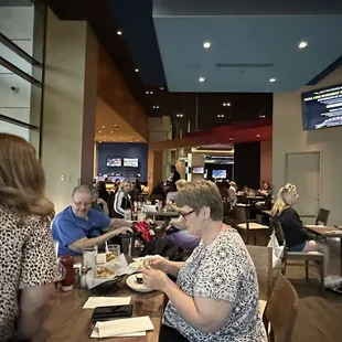 Restaurant with tables &amp; TVs