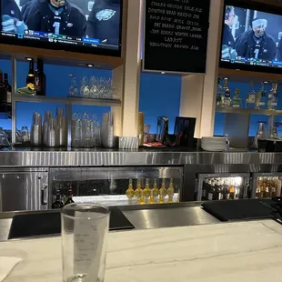 Bar area with my running tan in shot glass