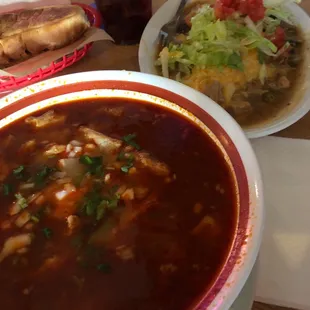 a bowl of soup and a sandwich