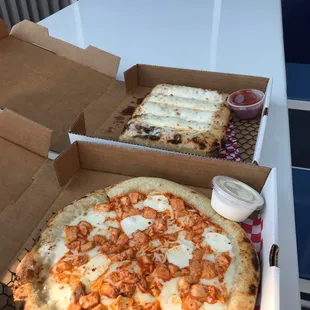 Buffalo chicken pizza and cheese sticks