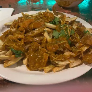 Whelans Irish Pub is amazing. I'd suggest anything on or off the menu. The Chicken Curry over fries is to die for.