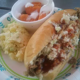 Pulled pork sandwich with my candied yams and my husband's potato salad