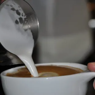 Finishing off a perfect latte.  Perfect balance of flavor and smoothness.