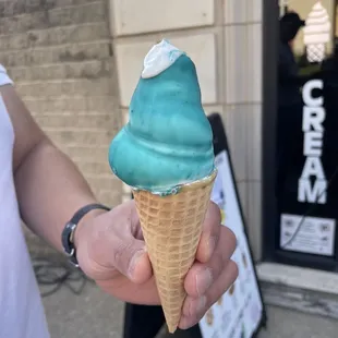 Vanilla and the sugar cone with blue raspberry hard shell