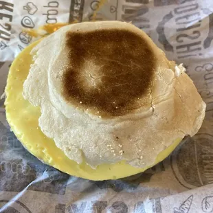 breakfast sandwich with moldy-smelling paper
