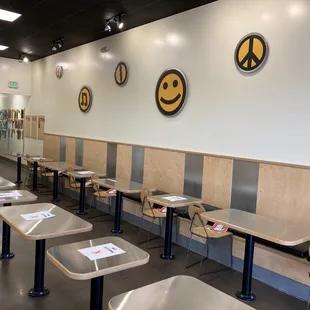 a row of empty tables in a restaurant