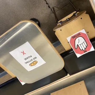 a hand holding a piece of paper