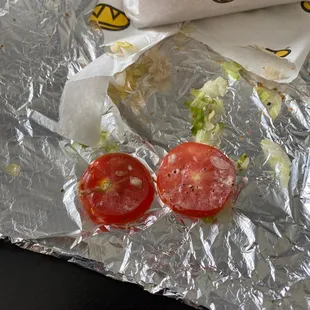 The butt of the tomato.