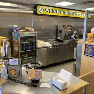 a kitchen with stainless steel counter tops