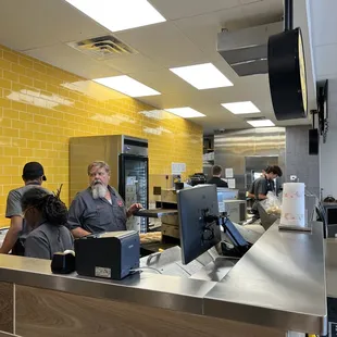 a group of people in a restaurant