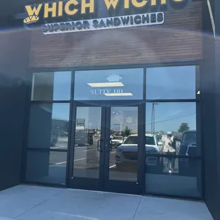 the entrance to a sandwich shop