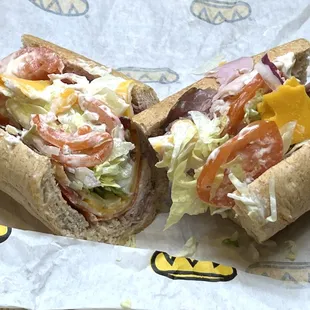 The Wednesday Wicked Wich Wich. Good roll. Lots of veggies. Ham, turkey, roast beef, bacon slices. Tasty and just enough!