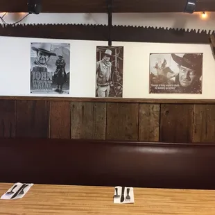a restaurant with a wooden booth