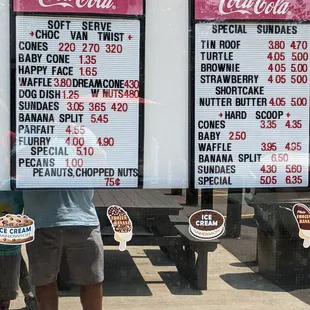 a man standing in front of a window