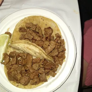 Tacos de carne asada plain as requested.