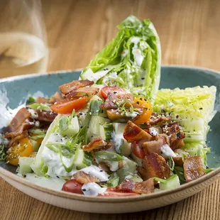 a salad with lettuce and bacon