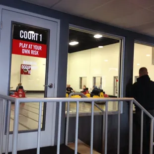 a group of people entering a court