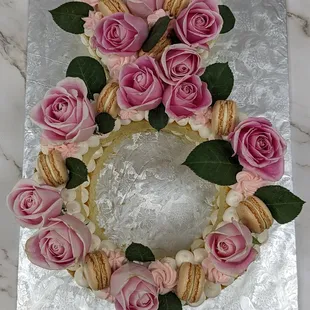 Engagement Ring Cake, accented with fresh roses &amp; macarons.