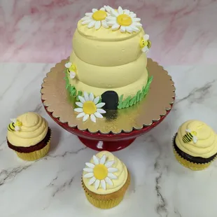 Honey bee themed Smash Cake with matching Cupcakes.