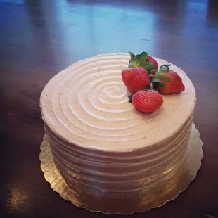 Strawberry cake with fresh strawberries buttercream