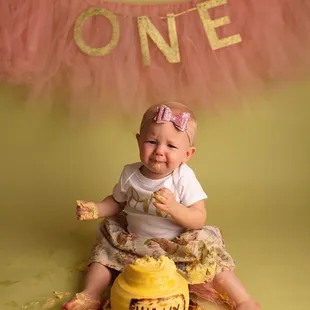 She didn't love photos, but couldn't pass up on the cake!