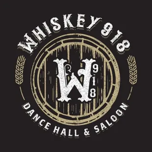 a barrel of whiskey and the words whiskey 818 dance hall and saloon