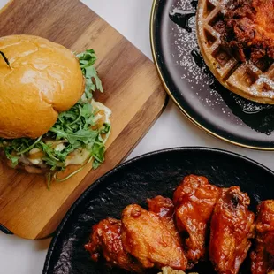 a waffle sandwich and chicken wings