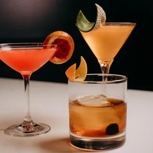 two cocktails on a table