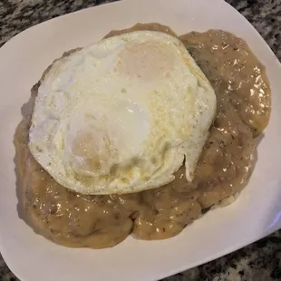 BABES SOS - beef Patty grilled, on sourdough, smothered in gravy &amp; potatoes- this one had 2 eggs on top