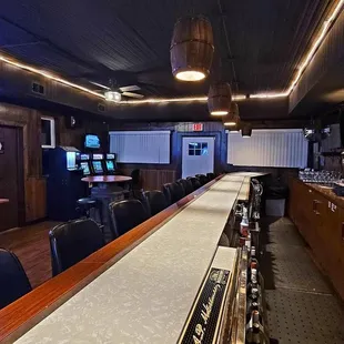 a bar with a neon sign