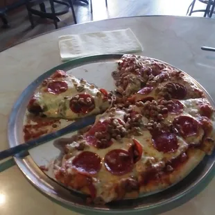 Sausage and pepperoni pizza.