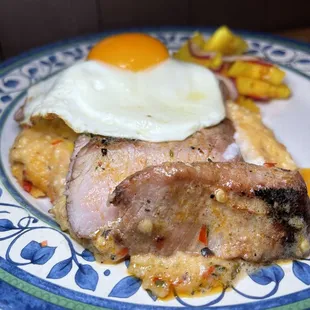 Pork brisket with grits and pickled tomatoes (delish)