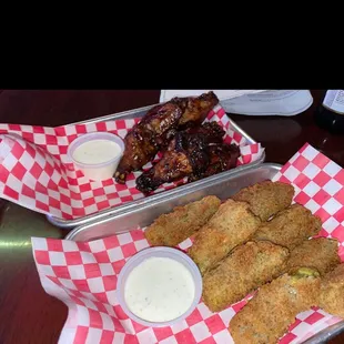Smoked whiskey wings and fried pickles