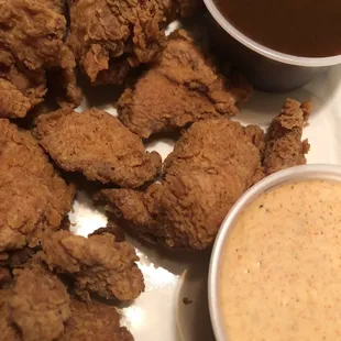 Hand Breaded Boneless wings with Caribbean Jerk and Alabama White dip sauce.