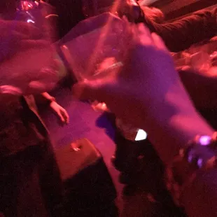 a person holding a glass of wine