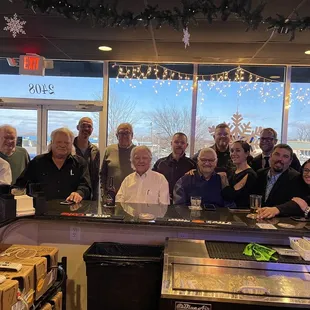 a group of people posing for a picture