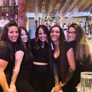 a group of women posing for a picture