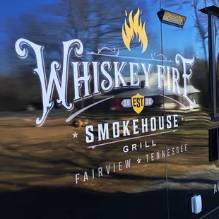 the logo on the side of a truck