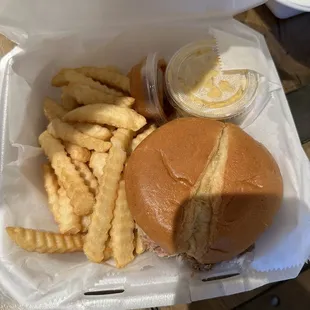Bbq pork sandwich with fries and Mac and cheese