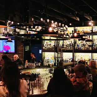 people sitting at a bar