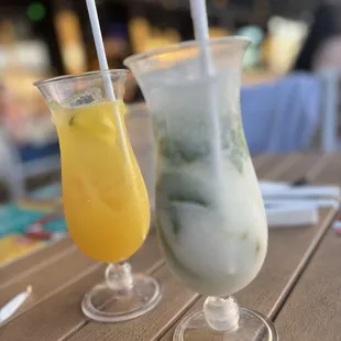 Coconut Mojito (Front) &amp; White sangria? (Back. That's what we ordered... not sure that's what we got.)