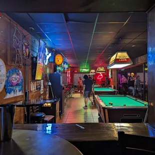 View from the backroom with the slot machines, 3 pool tables in the front