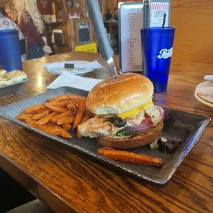 Build your own burger (chicken, pickles, fried egg, avocado, cheese) and potato fries. Worth it!
