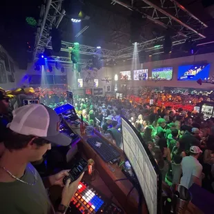 a crowd of people at a party