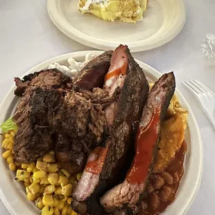 The Menu--Ribs, Brisket, Pulled Pork, Sausage, Elote Con, Baked Beans, Mac n Cheese, Mac Salad, Banana Pudding
