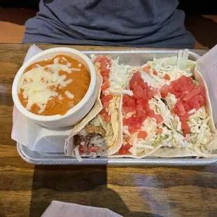 3 tacos and refried beans