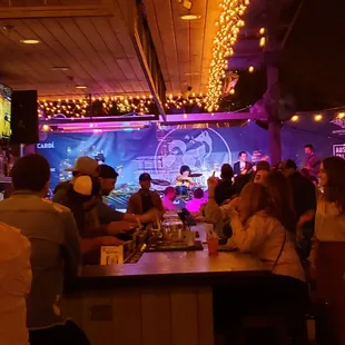 Two staff not wearing face masks during a pandemic. 'nuff said.